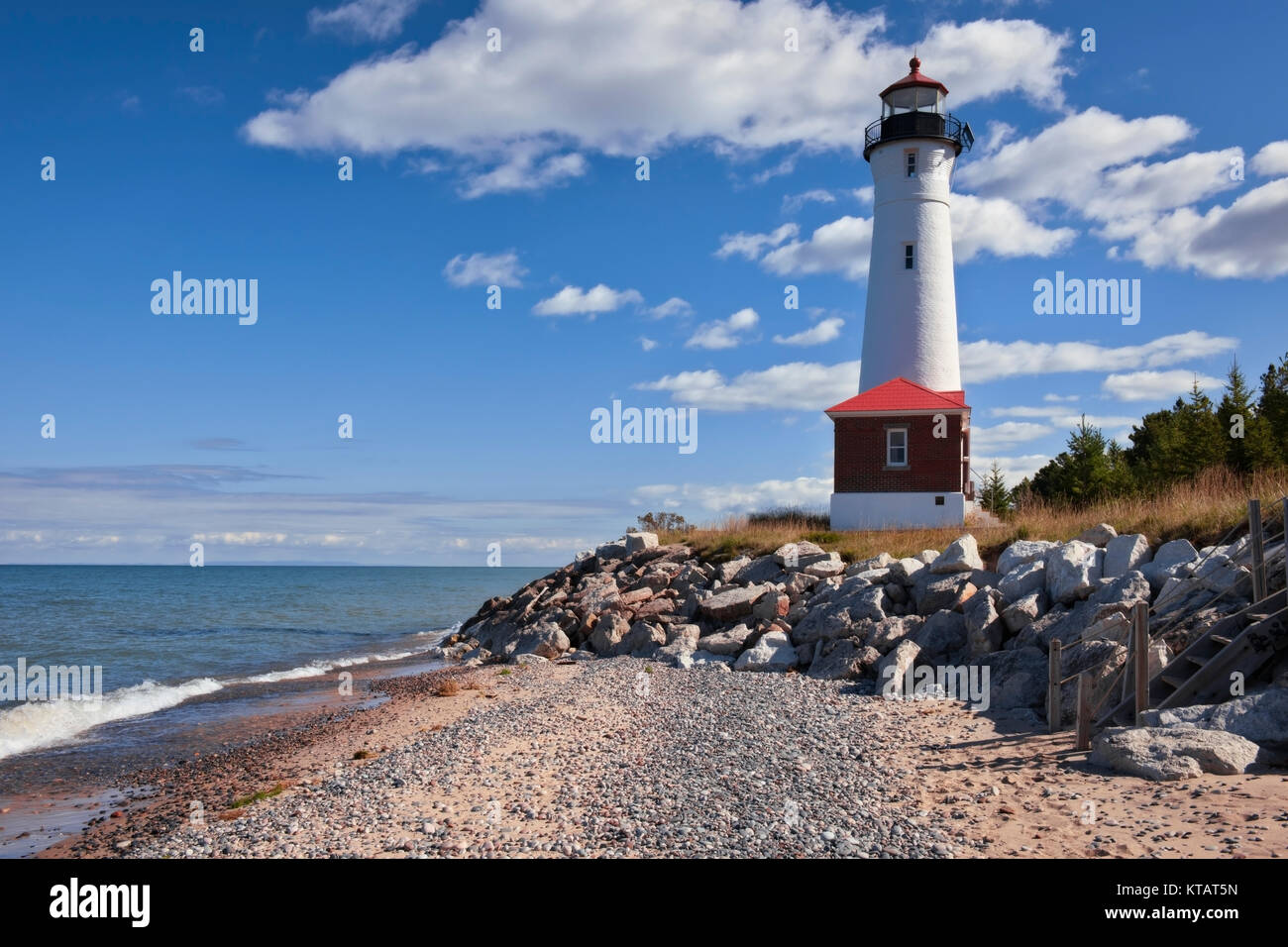 Remote Crisp Point Lighthouse (1904) towers over the Shipwreck Coast of Lake Superior in Michigan’s Upper Peninsula and Luce County. Stock Photo