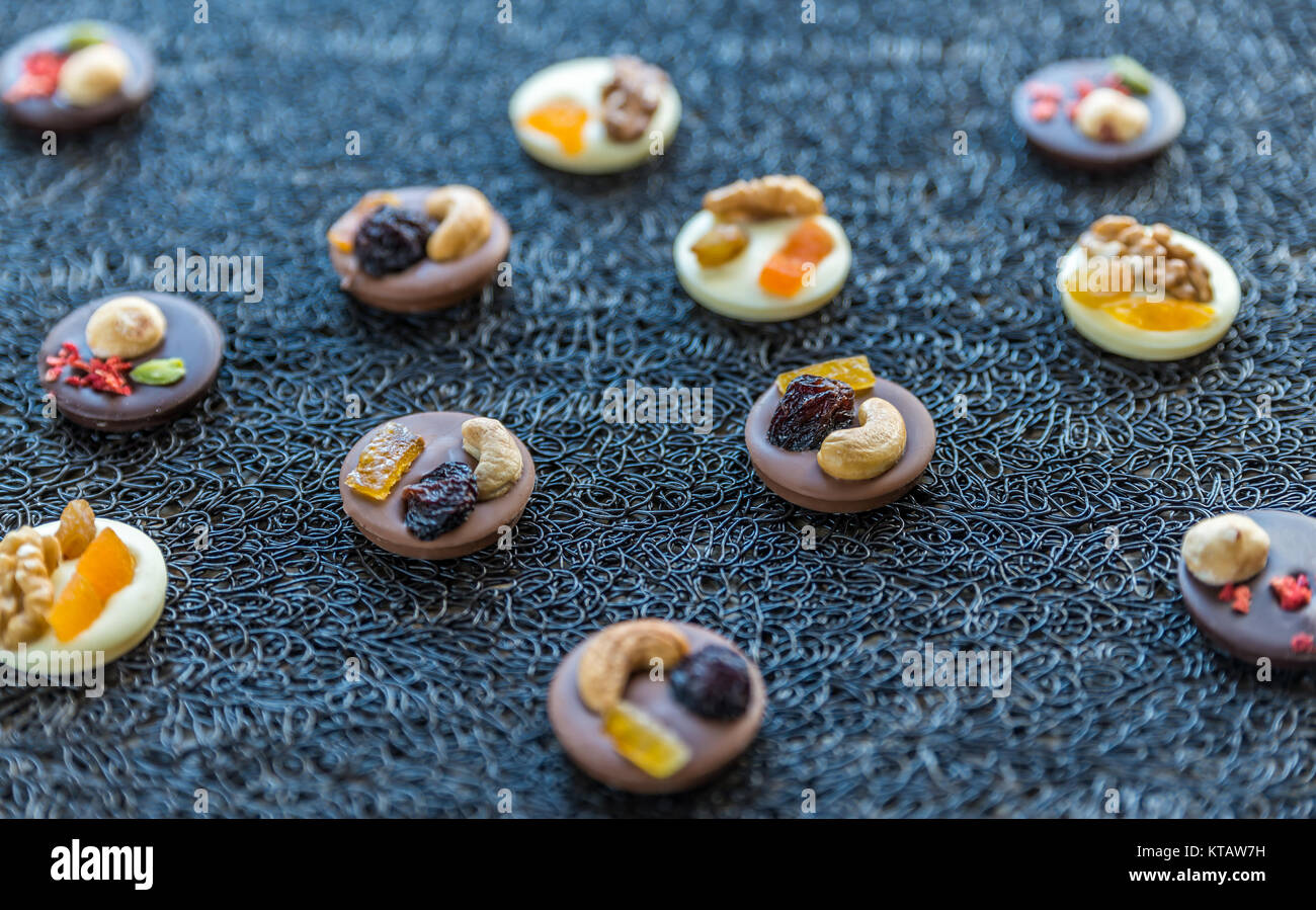 Swiss chocolate candies with nuts and dried fruits Stock Photo Alamy