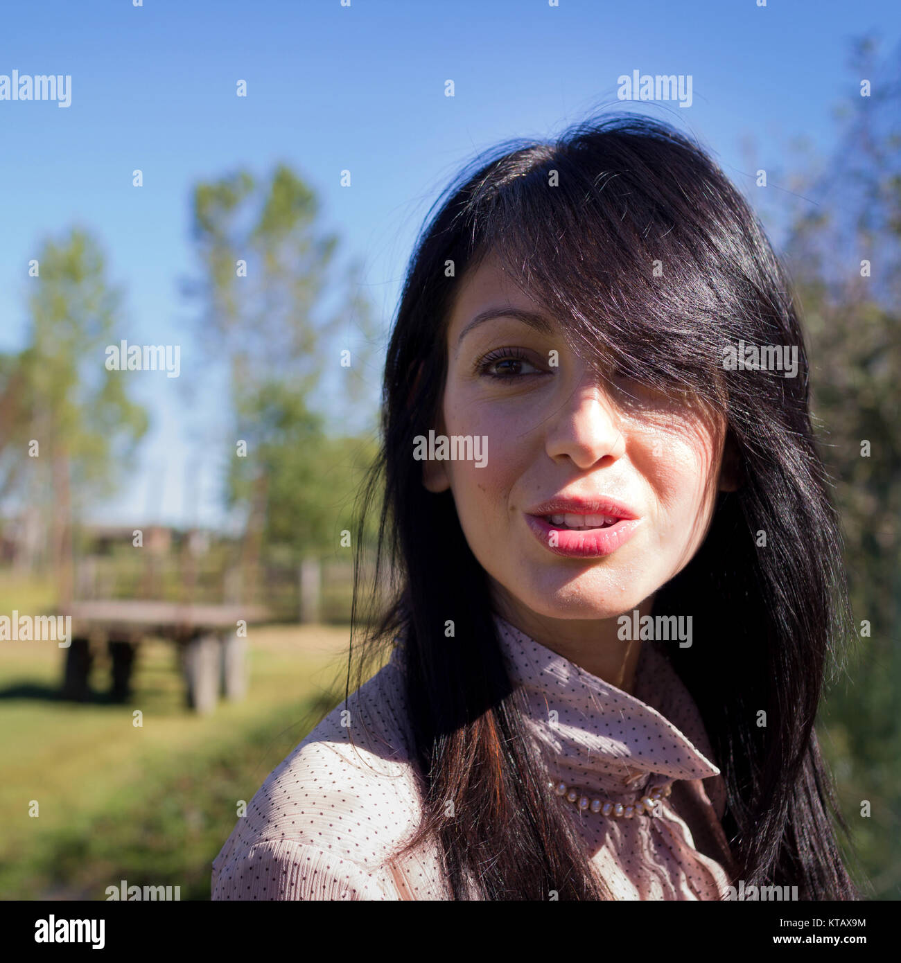 Attractive young woman Stock Photo - Alamy