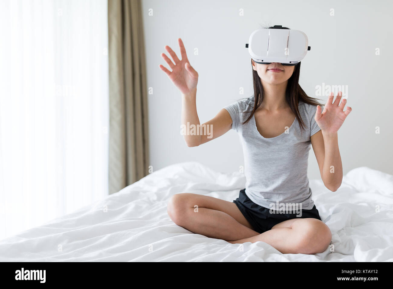 Woman experience virtual reality device Stock Photo Alamy