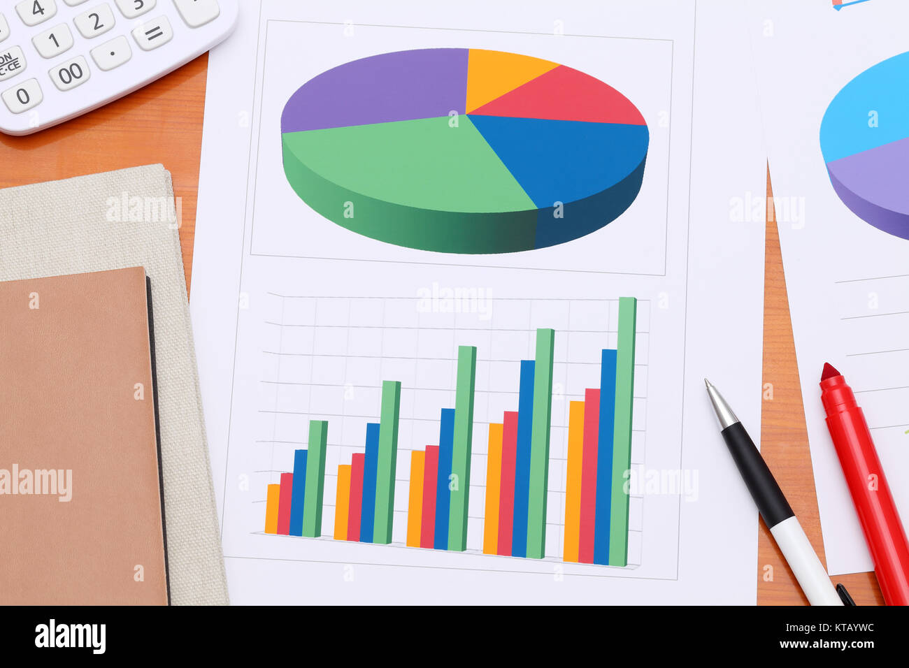 Color chart printed documents with pen and notebook Stock Photo Alamy