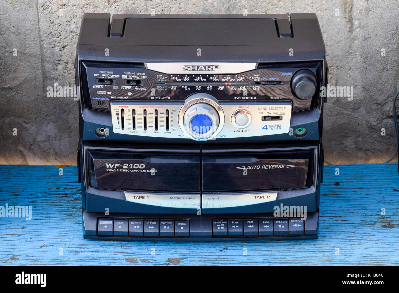Cassette tape recorder with radio on a blue wooden table. Vintag Stock  Photo - Alamy