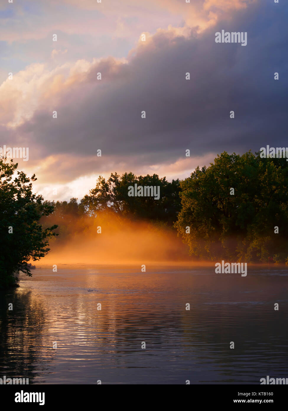 Mist at sunset on the Erie Canal near Utica, New York Stock Photo