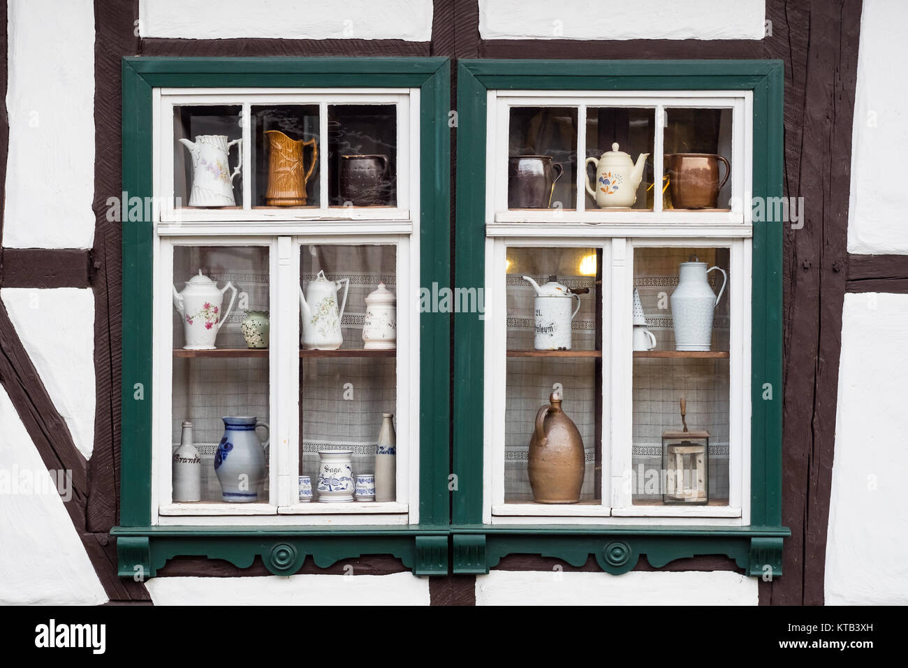 window decorated with coffee pots Stock Photo
