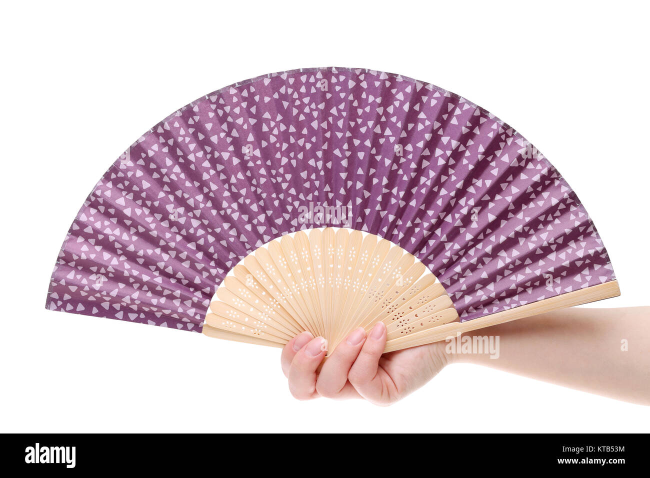 Hand holding chinese fan on a white background Stock Photo - Alamy