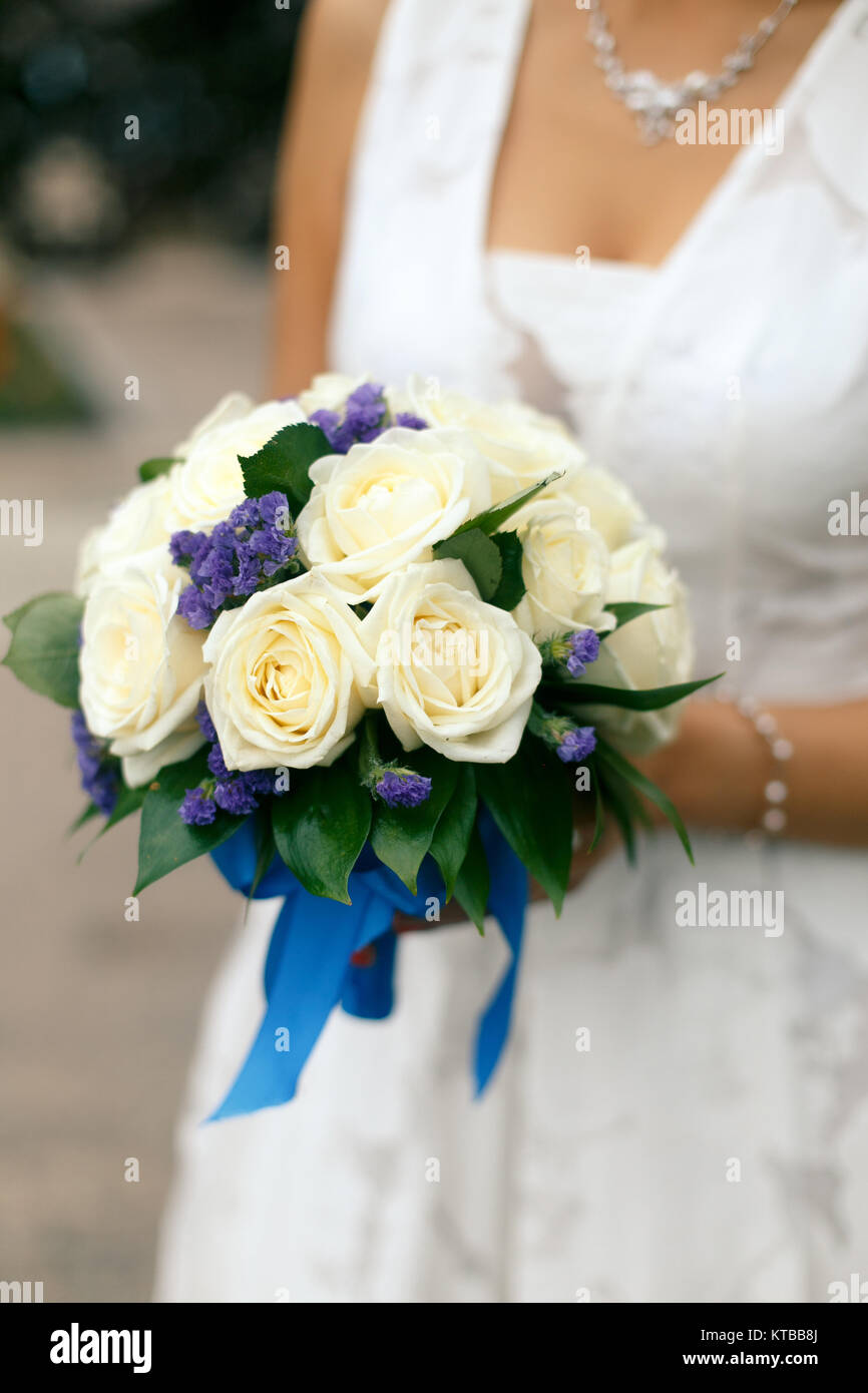 cream and blue wedding bouquets