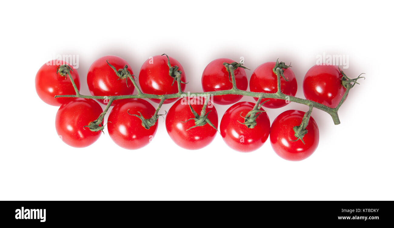 Cherry tomatoes on the stem top view Stock Photo