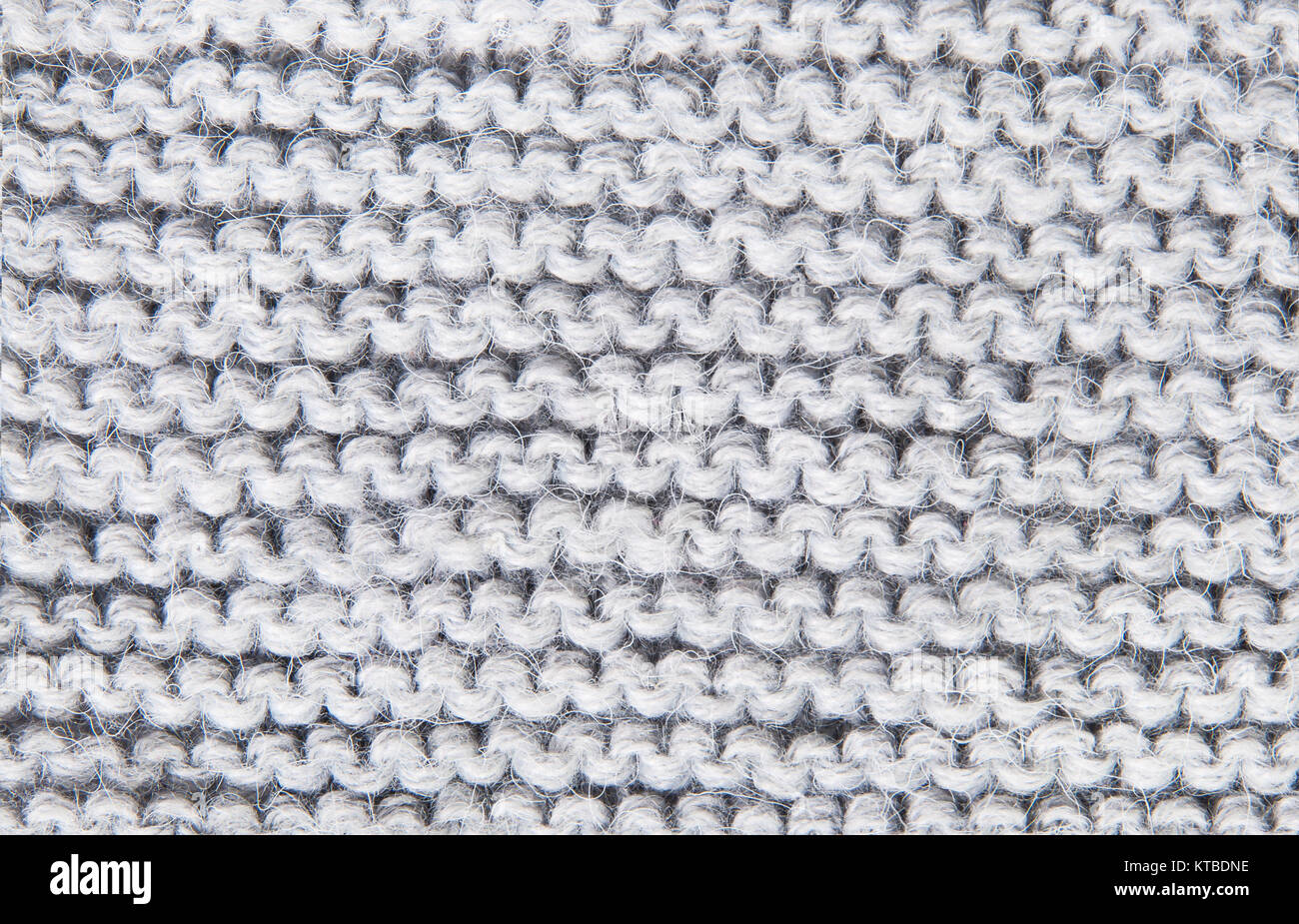 Background large knitted woolen threads of gray Stock Photo - Alamy
