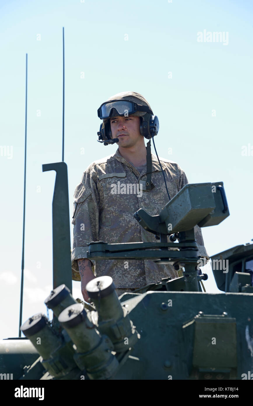 GREYMOUTH, NEW ZEALAND, NOVEMBER 18, 2017: Portrait of a crew member on a Light Armoured Vehicle (LAV) at an open day for the military. Stock Photo