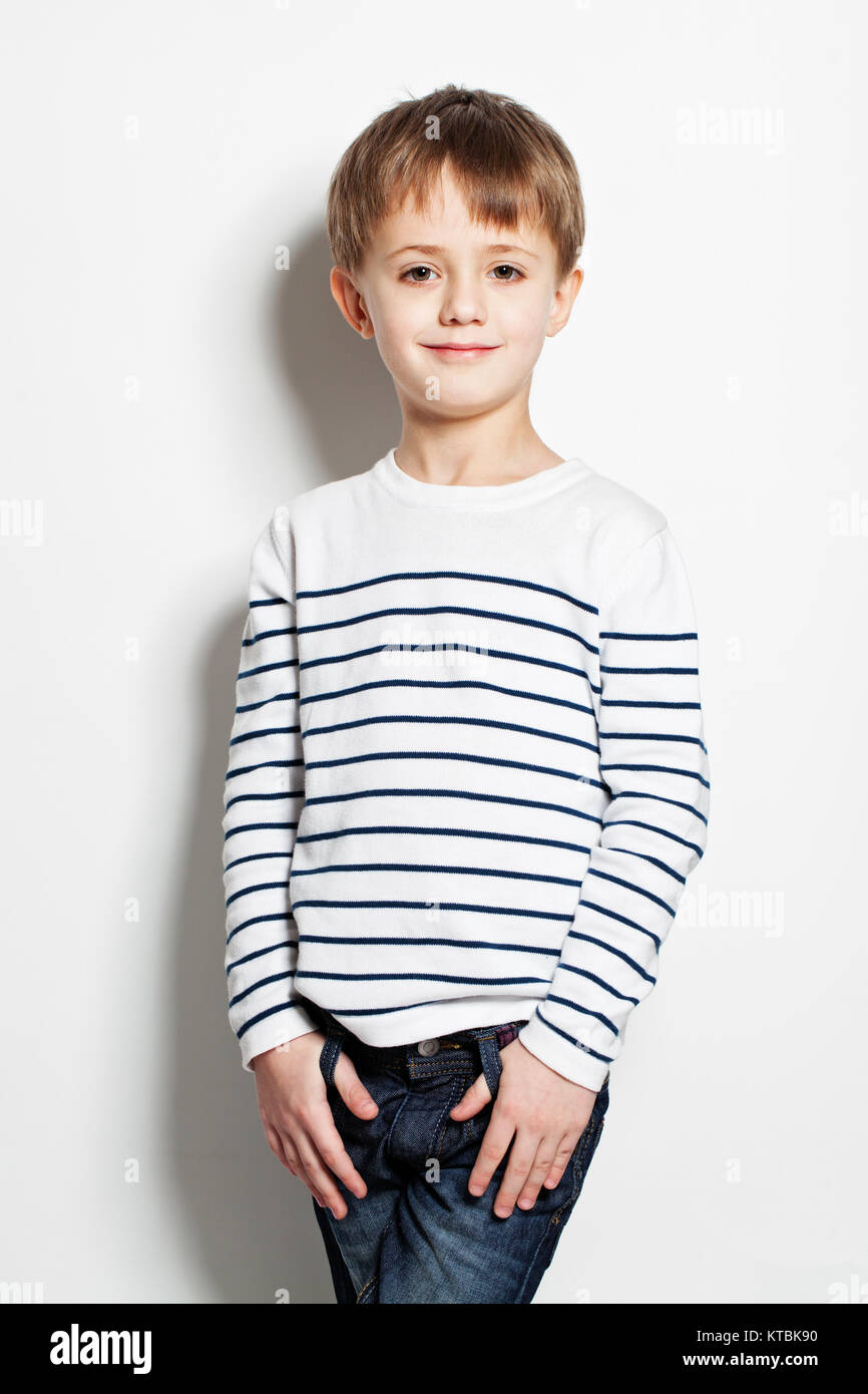 Cute little boy standing on background Stock Photo Alamy