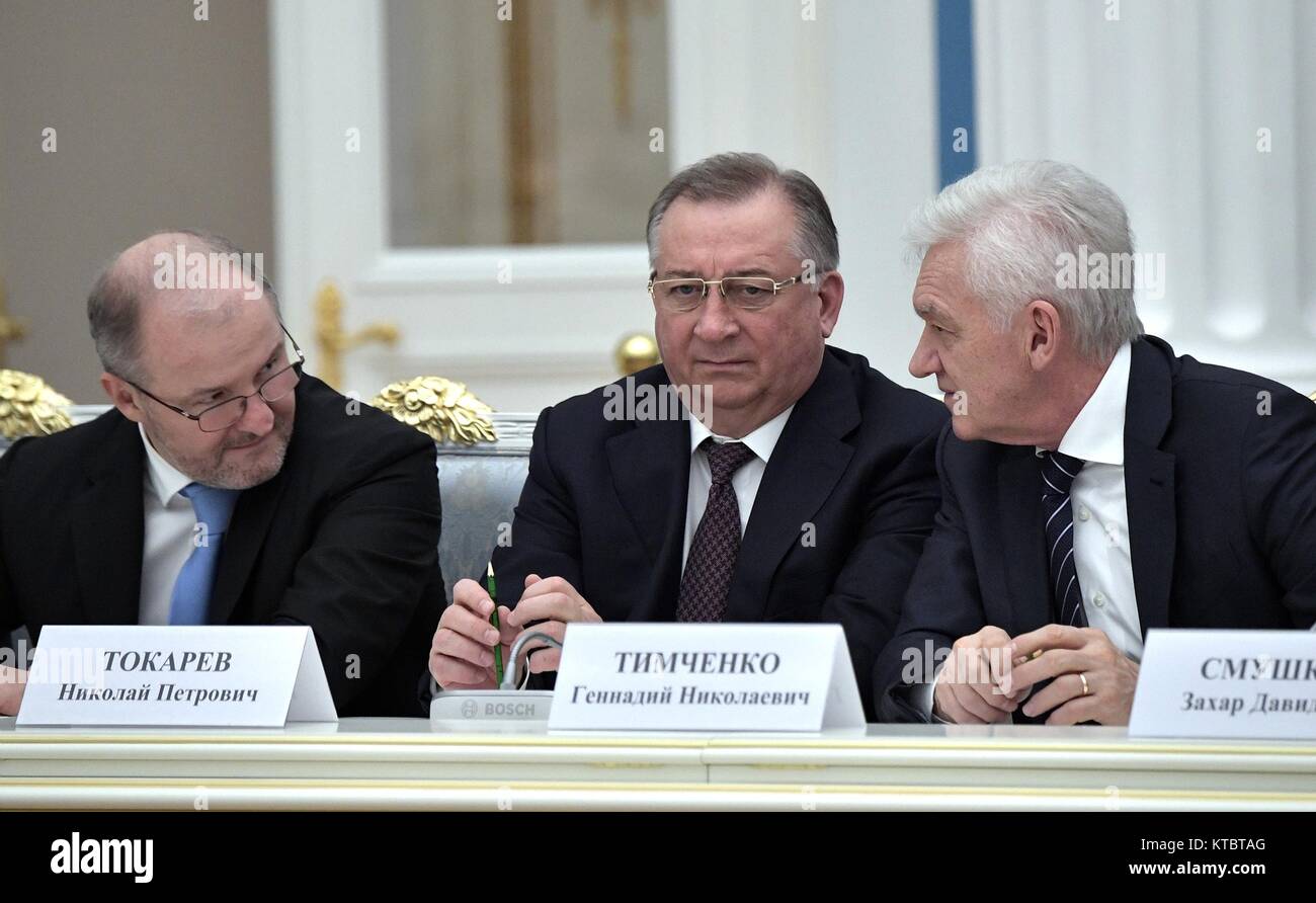 Chairman of AEON Corporation Roman Trotsenko, left, Transneft President Nikolai Tokarev and founder of the Volga Group Gennady Timchenko, right, chat before a meeting with Russian President Vladimir Putin at the Kremlin December 22, 2017 in Moscow, Russia. Stock Photo