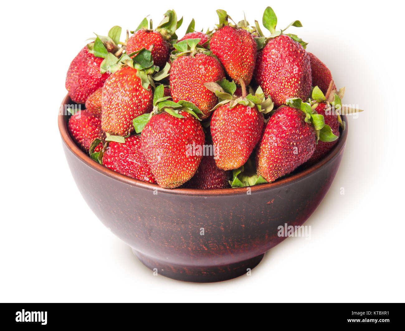 Ripe juicy strawberries in a ceramic bowl top view Stock Photo - Alamy