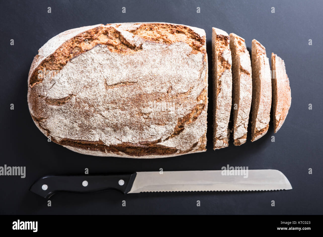 Sliced Bread With Knife Stock Photo Alamy