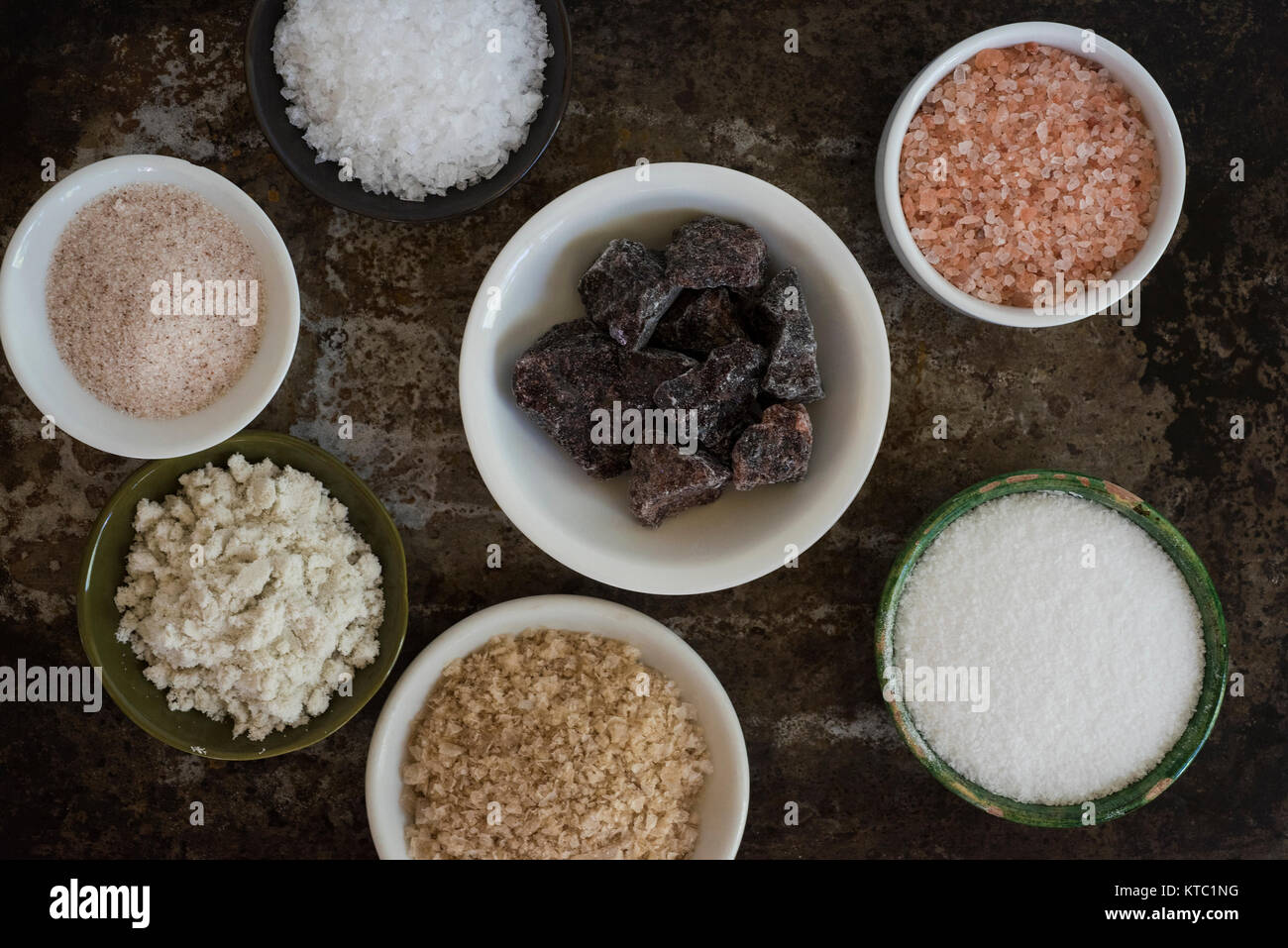 Assortment of salt in bowls Stock Photo Alamy