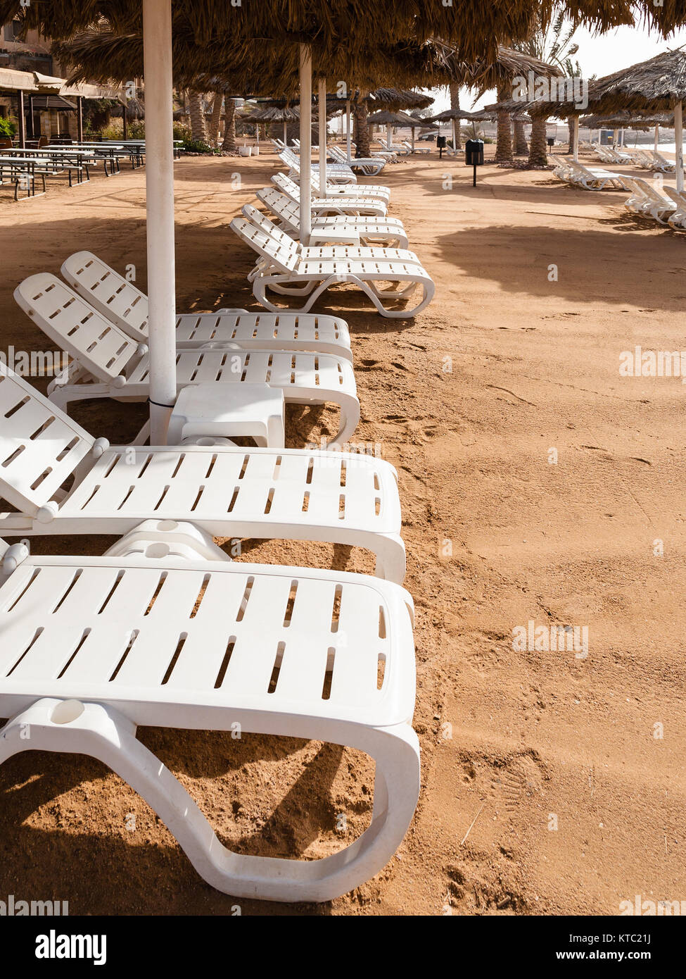 mpty sunbeds on beach in Aqaba city in winter Stock Photo Alamy