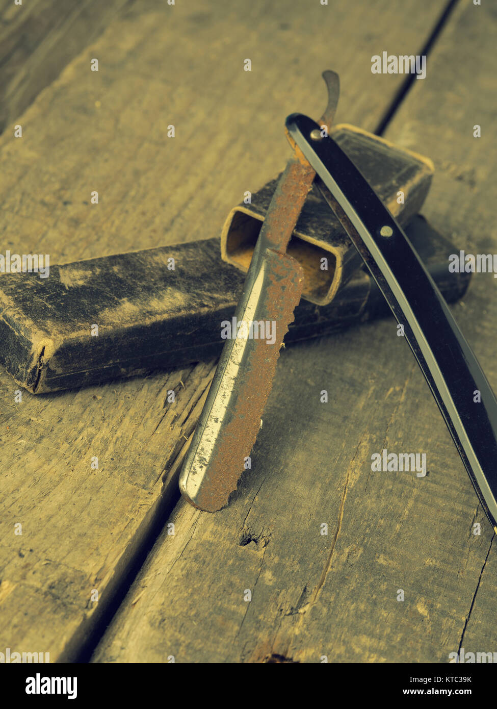 Old Money Razor Old and rusty razor on a rustic workbench with space for text or image ...