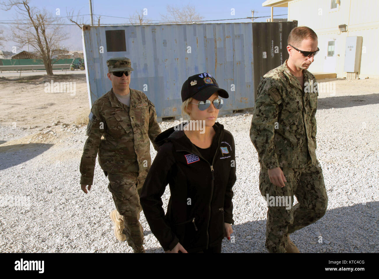 Country music artist Kellie Pickler tours the airbase during the USO Holiday troop visit at Bagram Air Field December 9, 2014 in Bagram, Afghanistan. Stock Photo