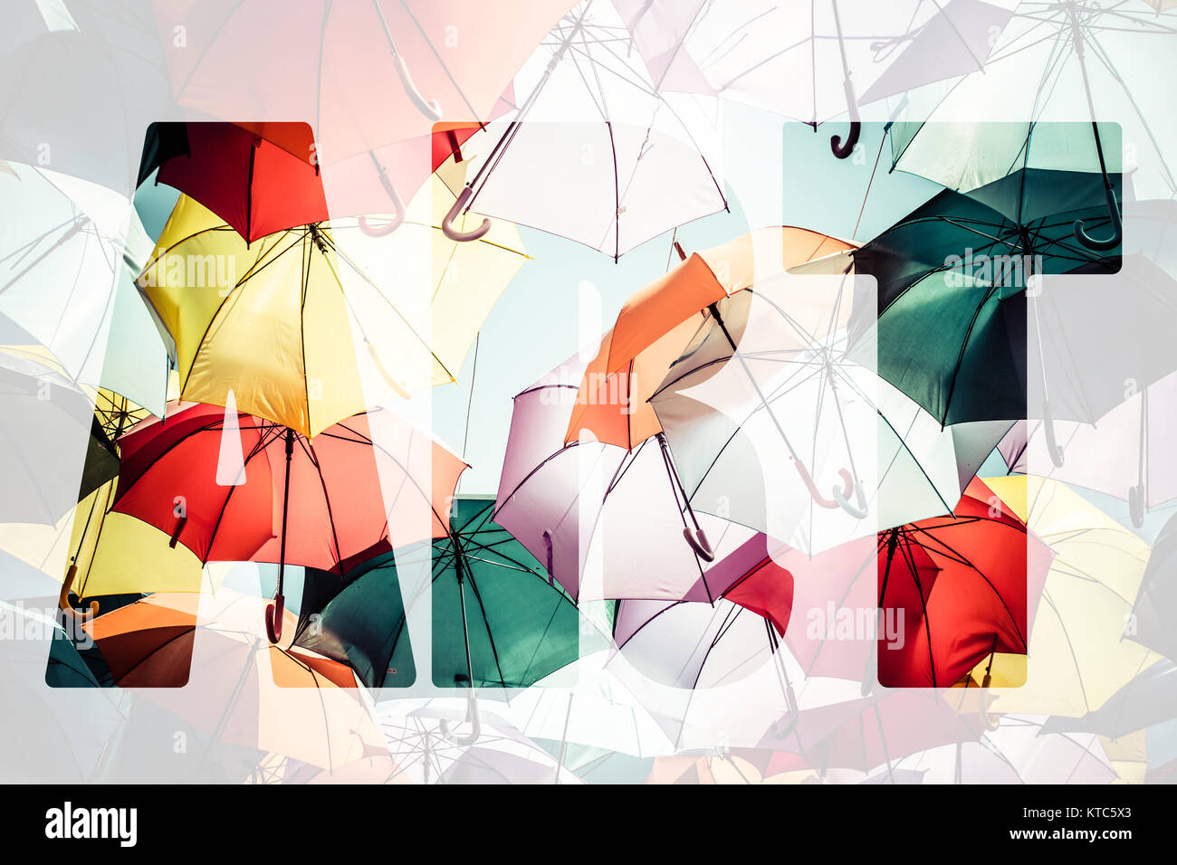 Word ART over colorful umbrellas Stock Photo Alamy