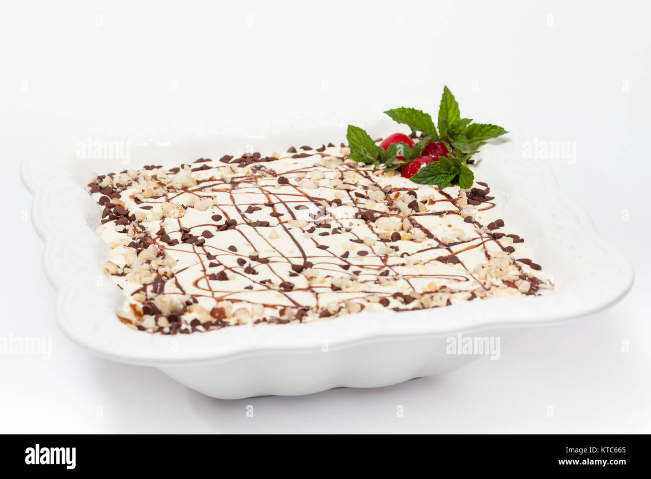 Decorated Napoleon dessert in a white bowl Stock Photo