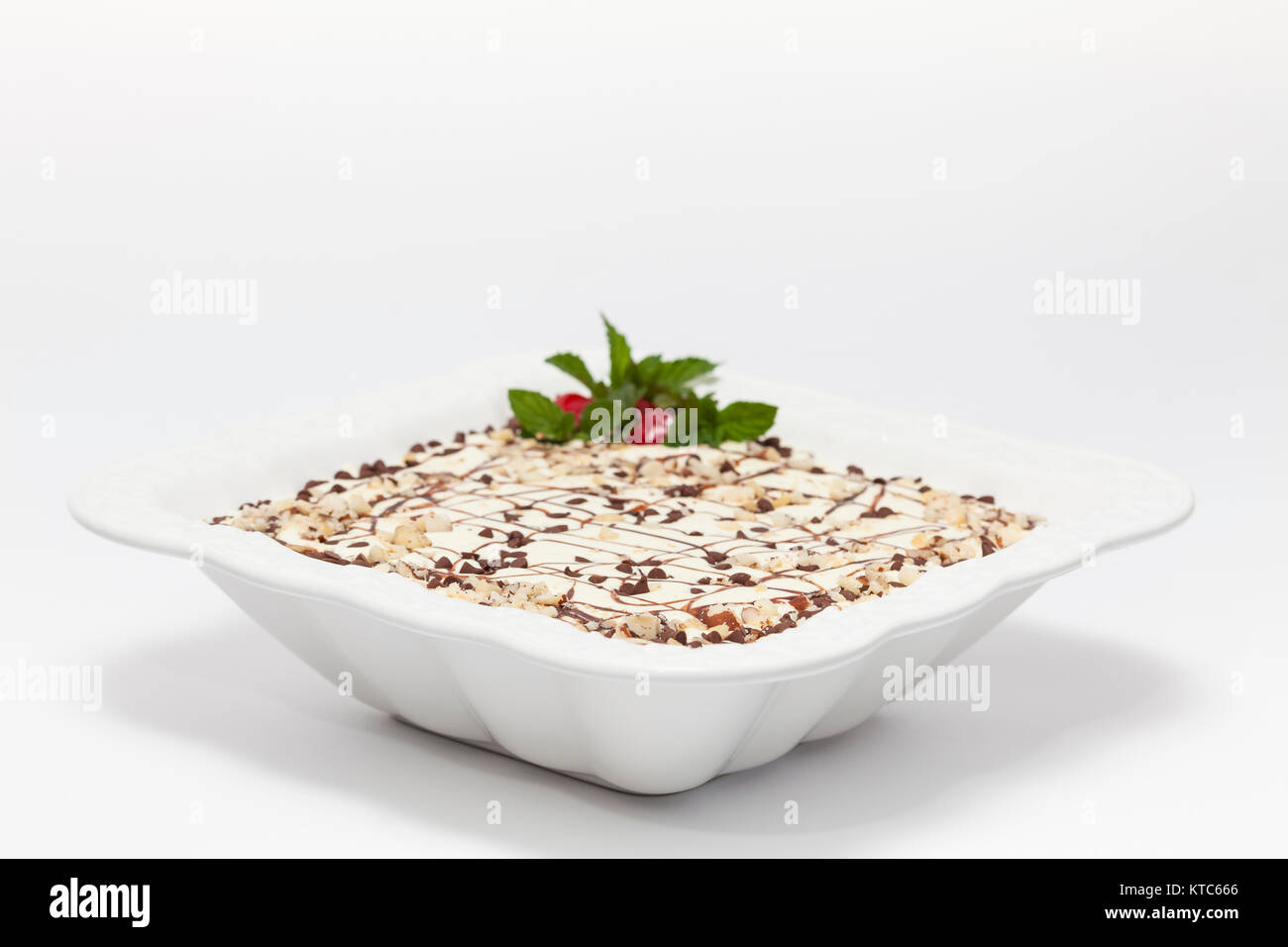 Decorated Napoleon dessert in a white bowl Stock Photo