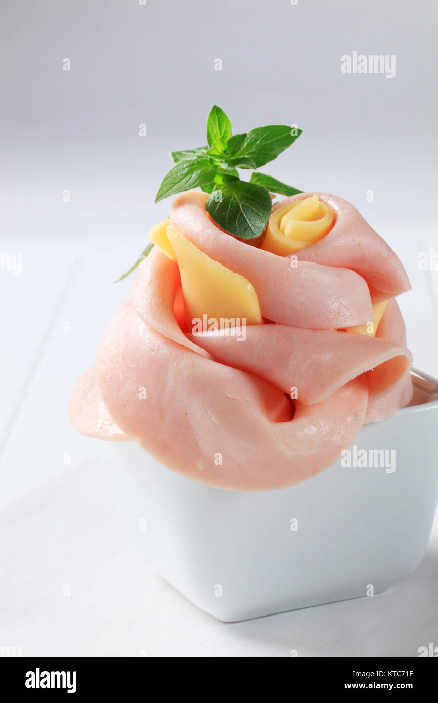 Ham and cheese shaped into a flower Stock Photo Alamy