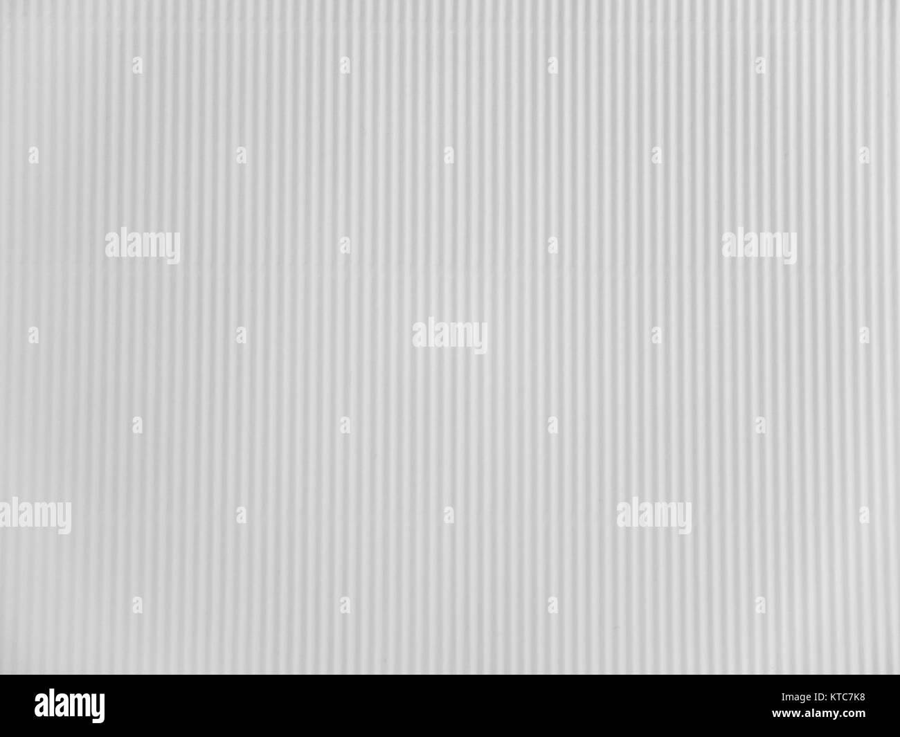 Off white corrugated paper texture closeup. Stock Photo