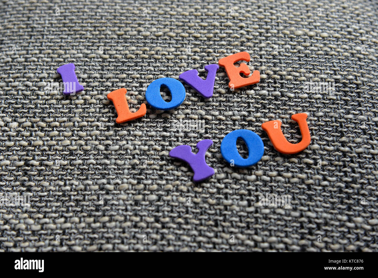 I love You auf Stoff Hintergrund Stock Photo