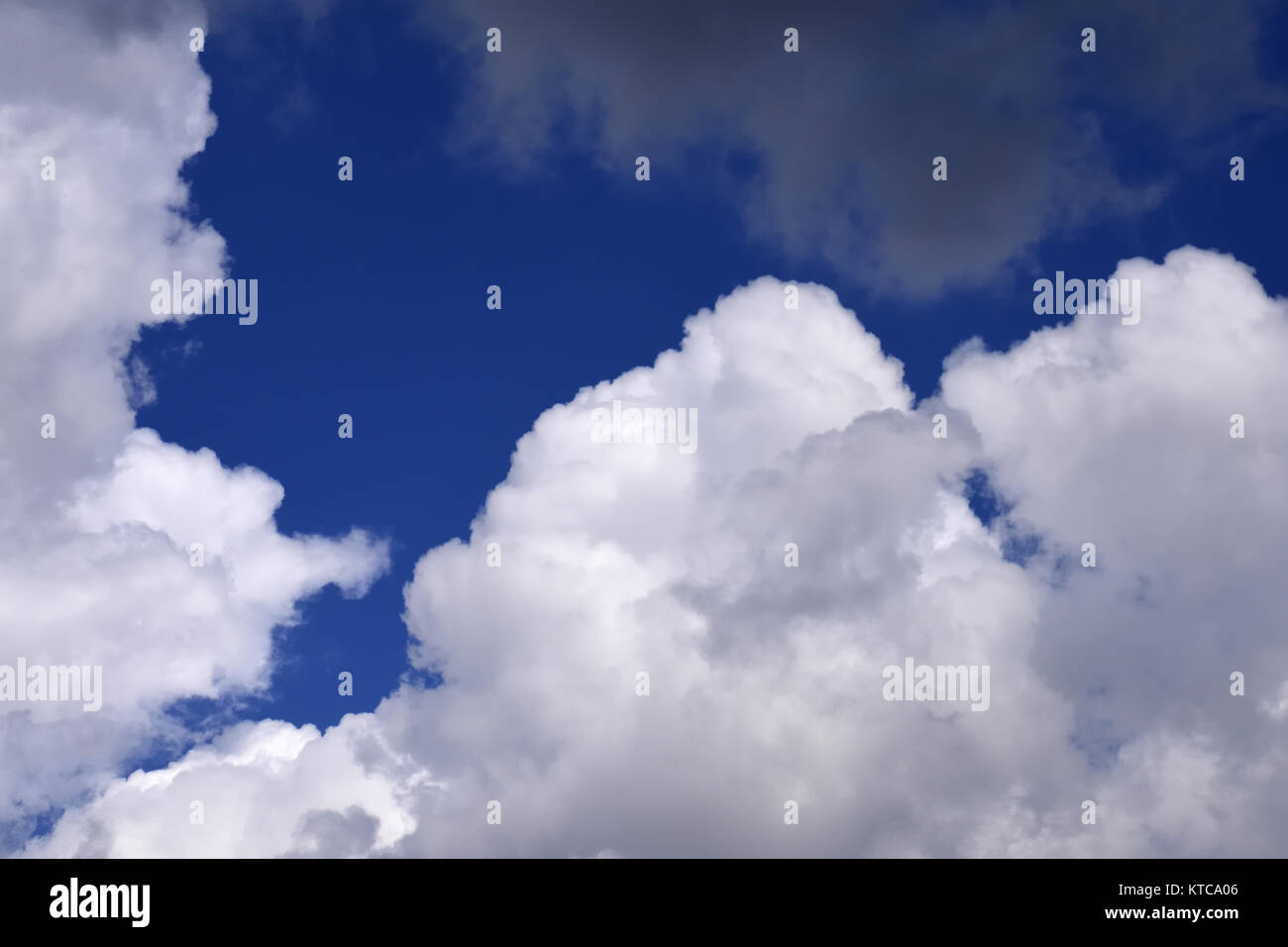 Cumulus white clouds in the blue sky Stock Photo - Alamy