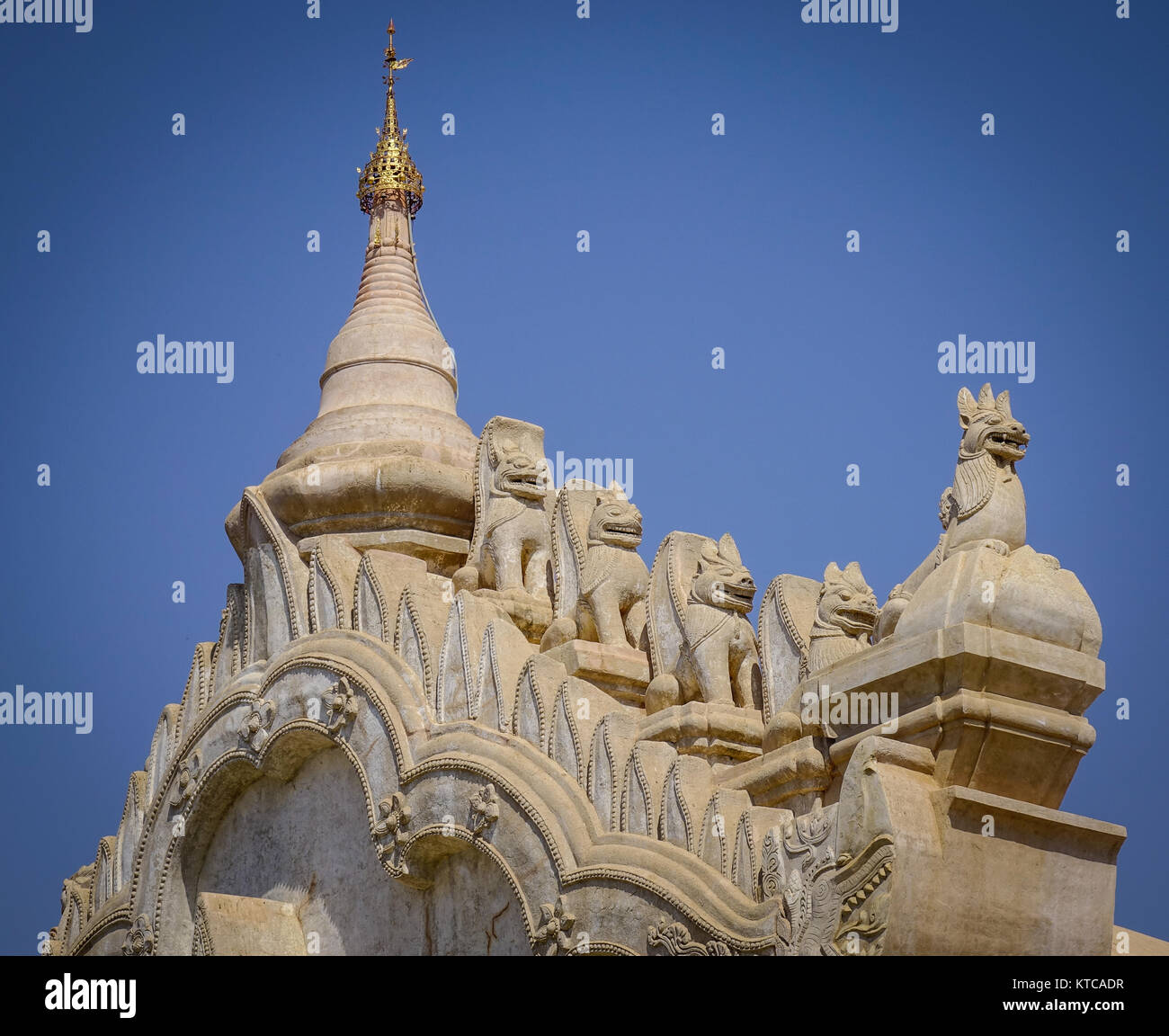 Top of the Ananda Temple at sunny day in Bagan, Myanmar. The Ananda Temple located in Bagan, is a Buddhist temple built in 1105 AD. Stock Photo