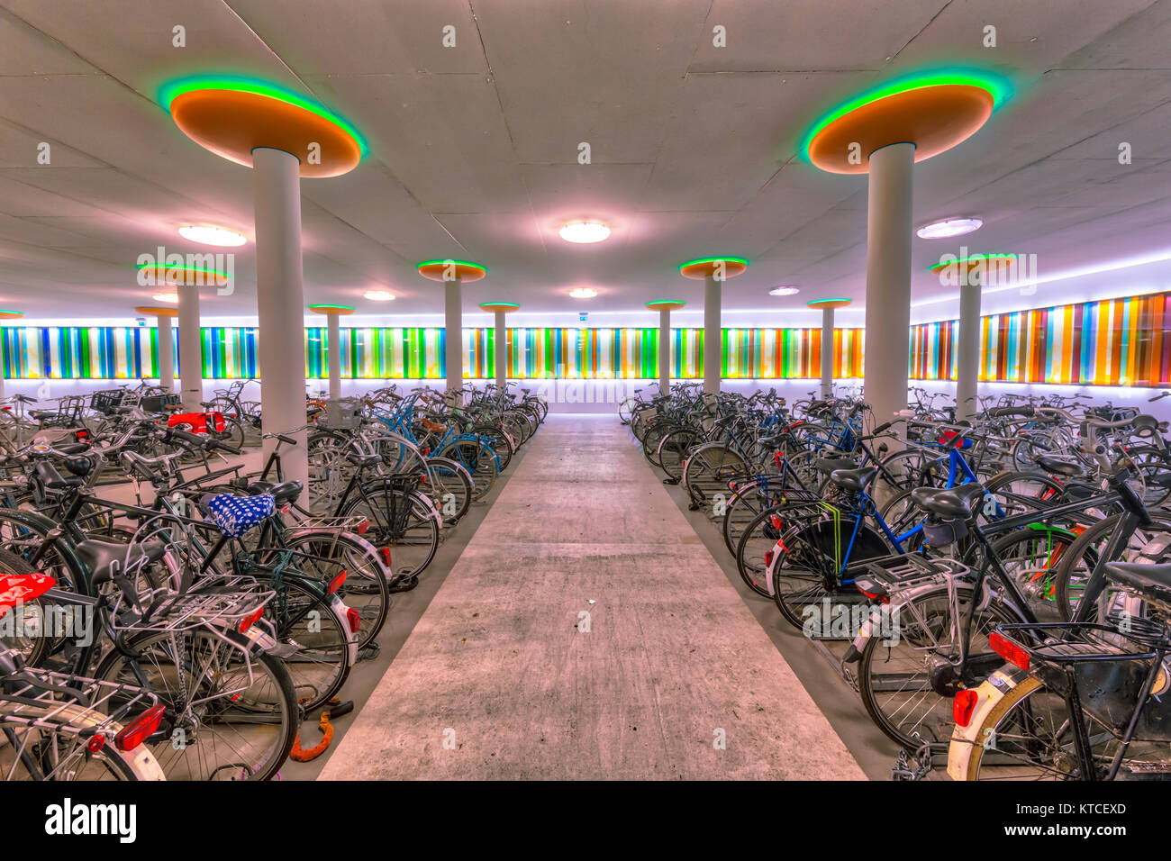 Modern indoor bicycle parking at a train station in the Netherlands