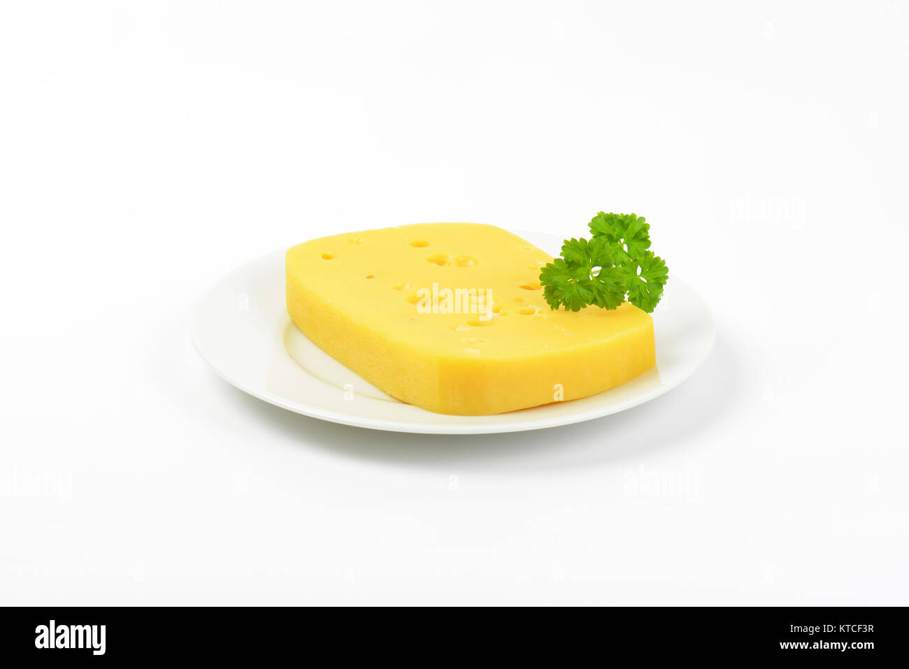 emmental cheese with holes Stock Photo Alamy