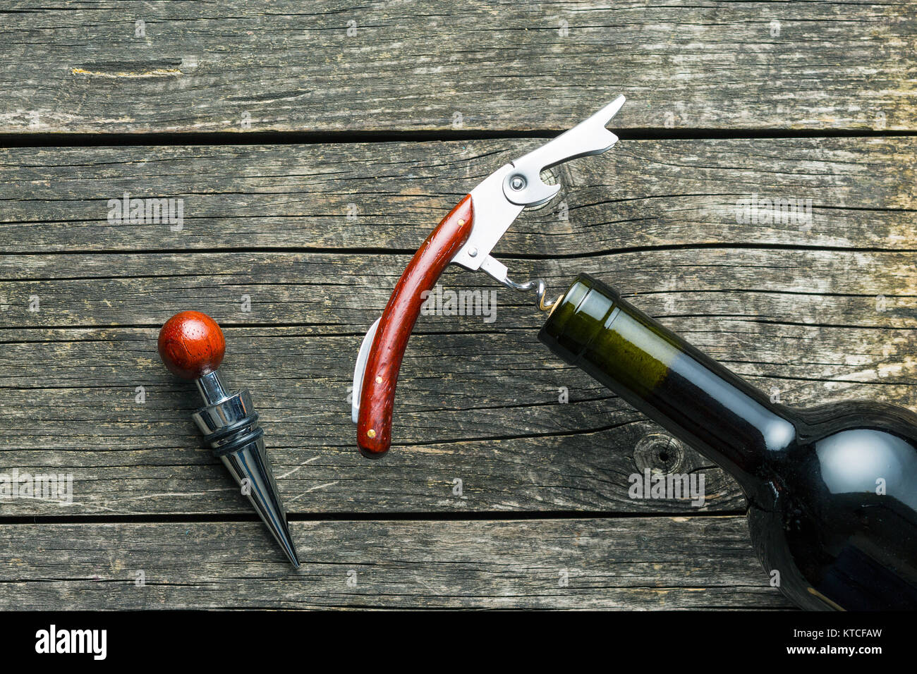 Bottle of wine with corkscrew Stock Photo Alamy
