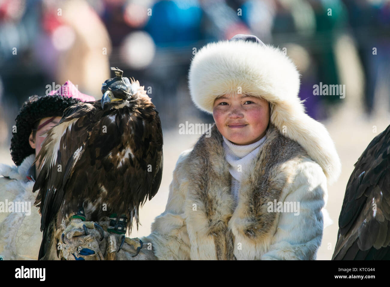 Aisholpan from The Eagle Huntress at the Golden Eagle Festival in Mongolia Stock Photo