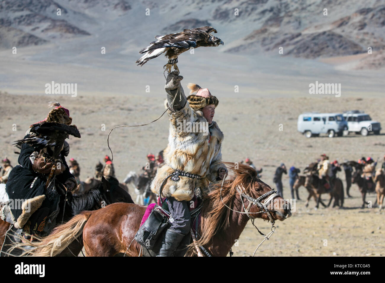 Kazakh eagle hunter at the Golden Eagle Festival in Mongolia Stock Photo