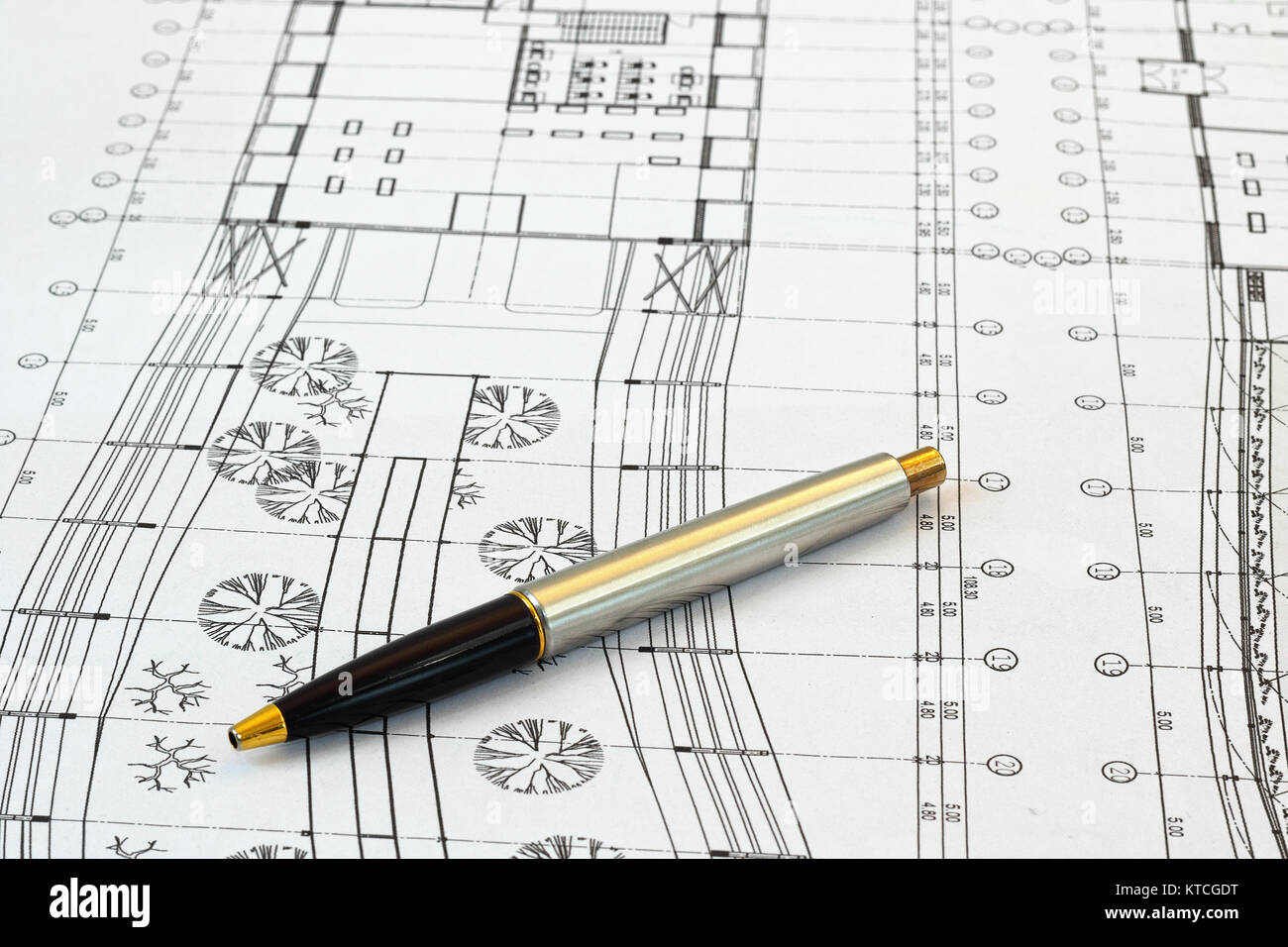 architect desk with pen and construction drafts, background Stock Photo