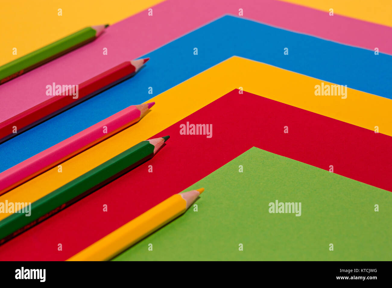 colored pencils and colour paper Stock Photo Alamy