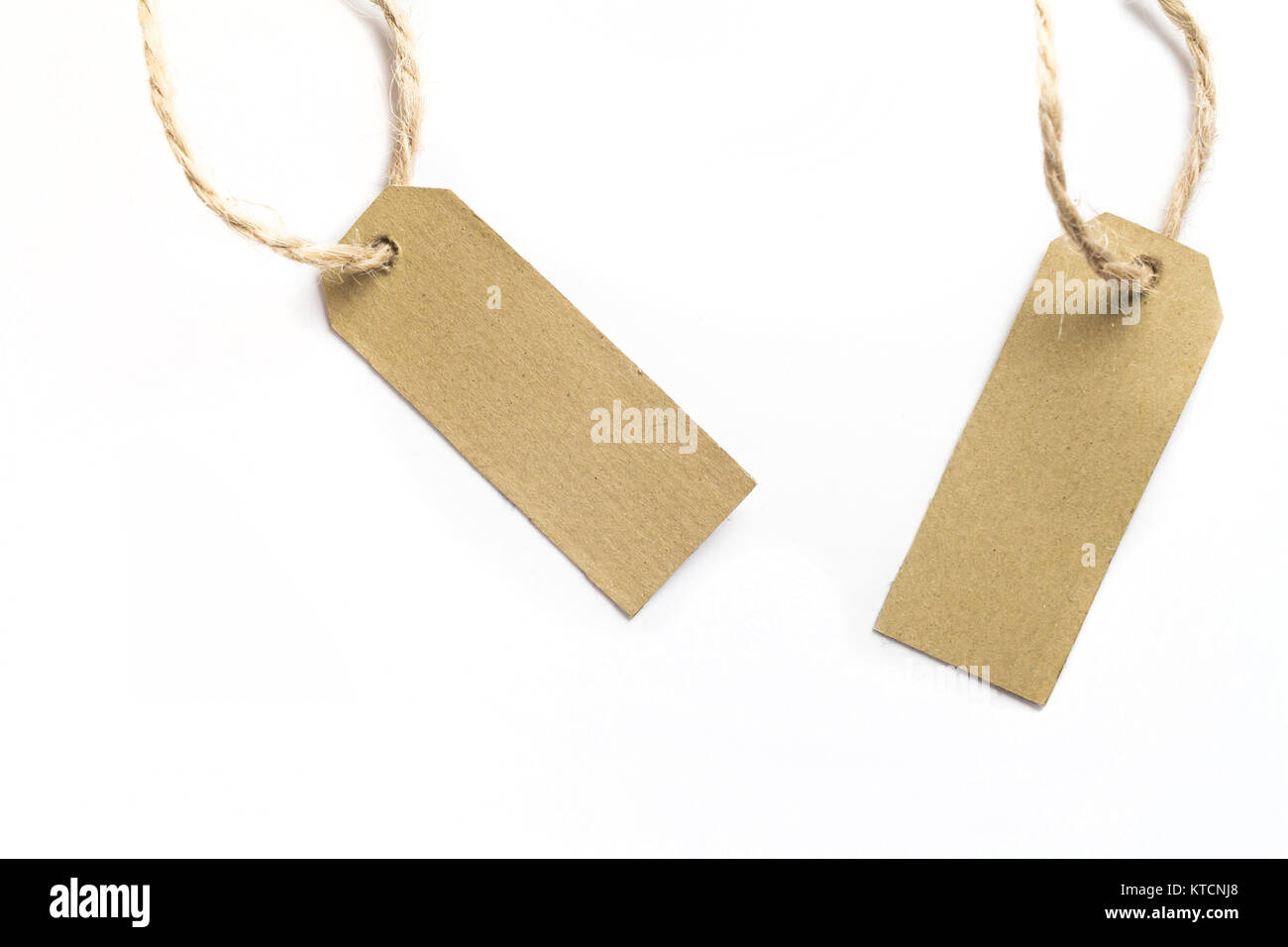 Brown price name tags with rope isolated on white background Stock