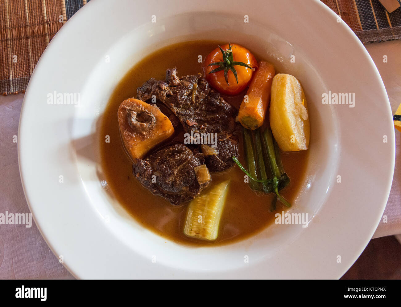Braised beef and bone marrow, a well prepared dish served at local restaurant Mad Zebu in Belo, a small town in west Madagascar, Africa. Stock Photo