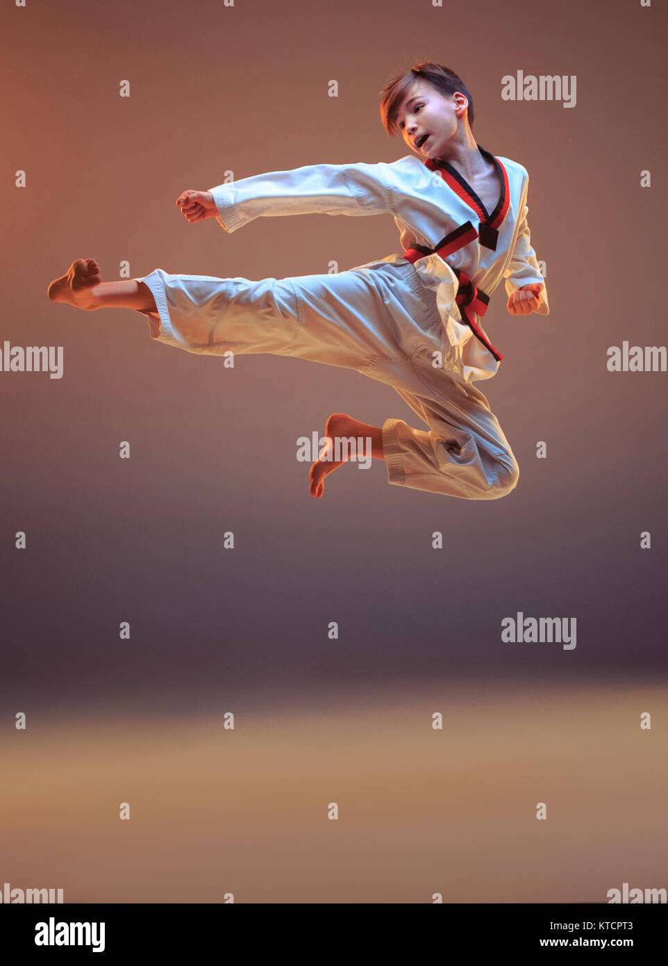 Karate jump kick child hi-res stock photography and images - Alamy