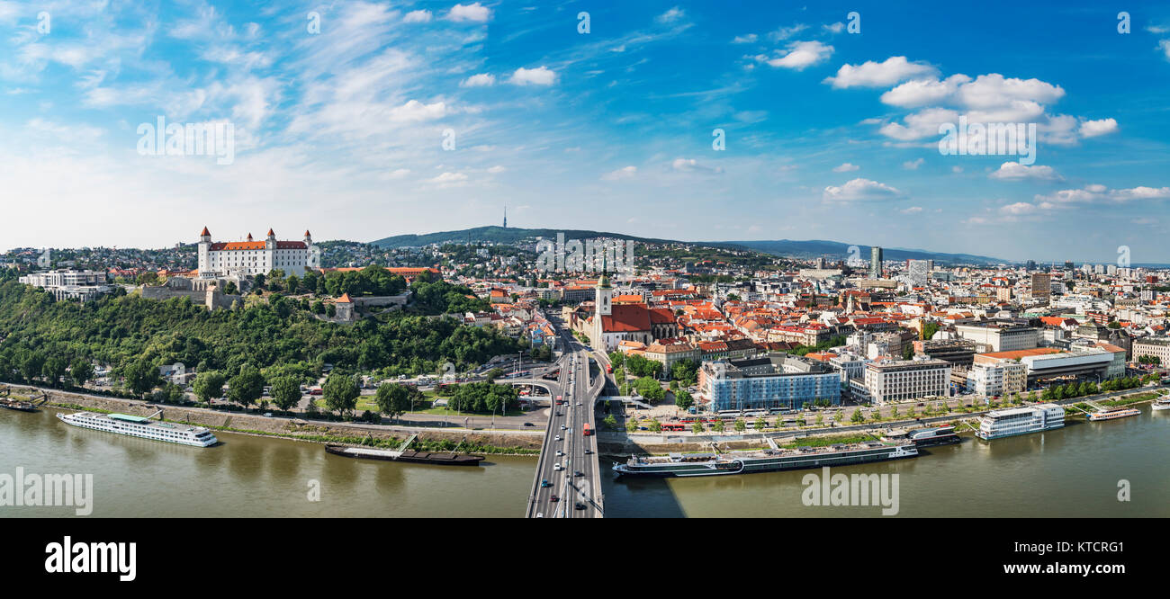 Panoramic view of Bratislava, the capital of Slovakia in Europe, the Danube River, the SNP Bridge, the Castle,  St. Martins Cathedral and the old town Stock Photo