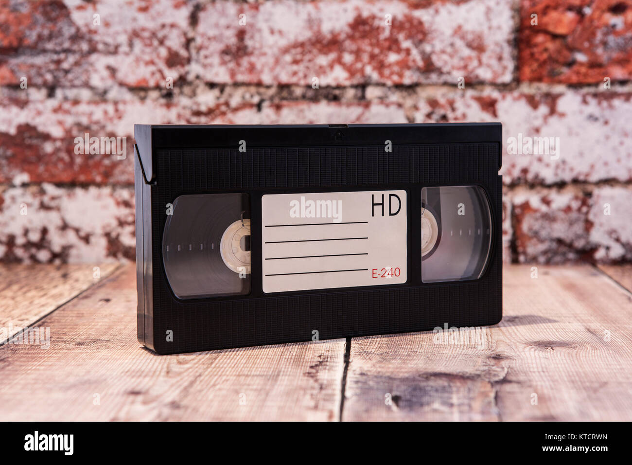 Old VHS Video cassette tape on a rustic background. Stock Photo