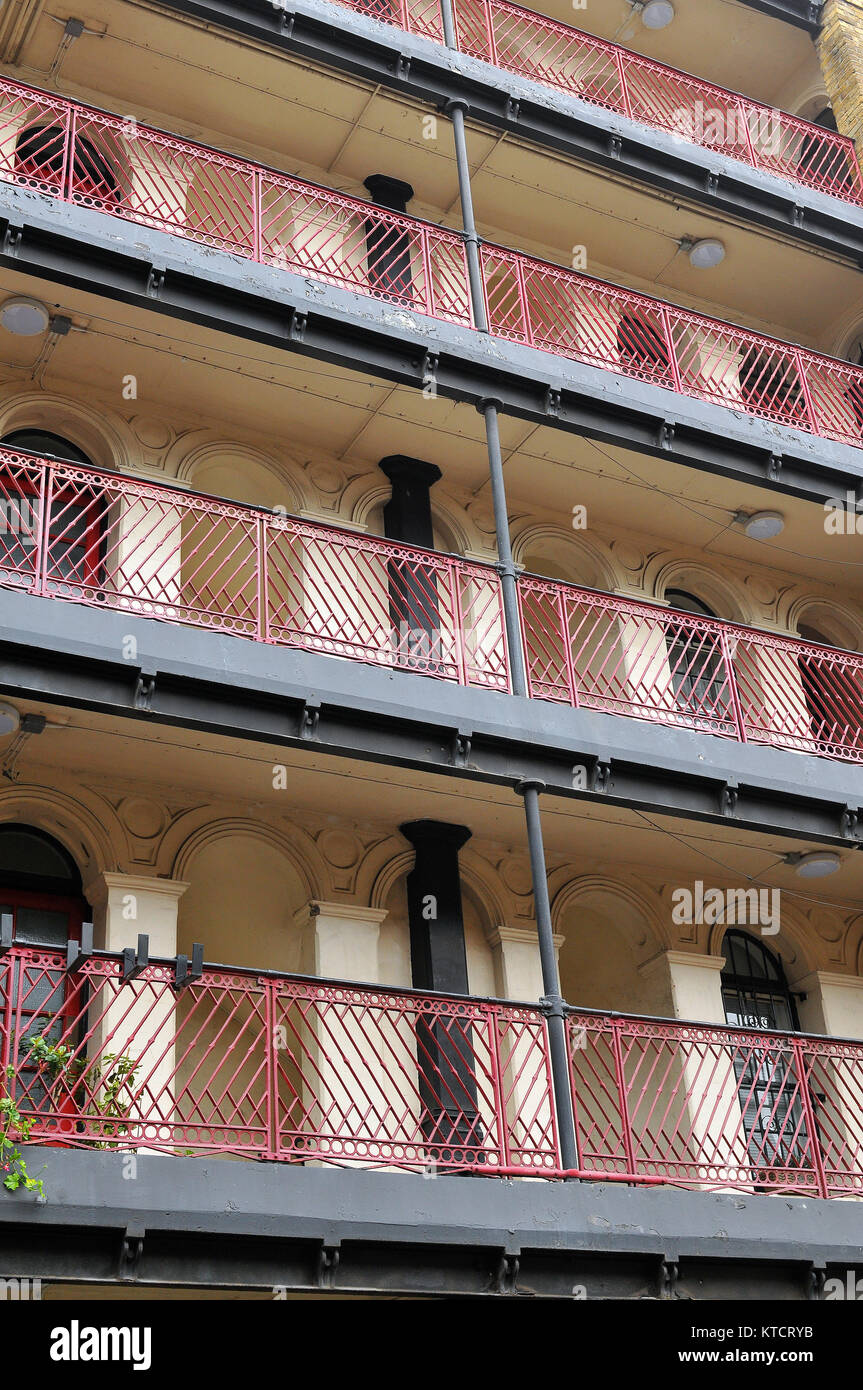 a block of flats or apartments in Blackfriars, central London with red ornate cast iron railings