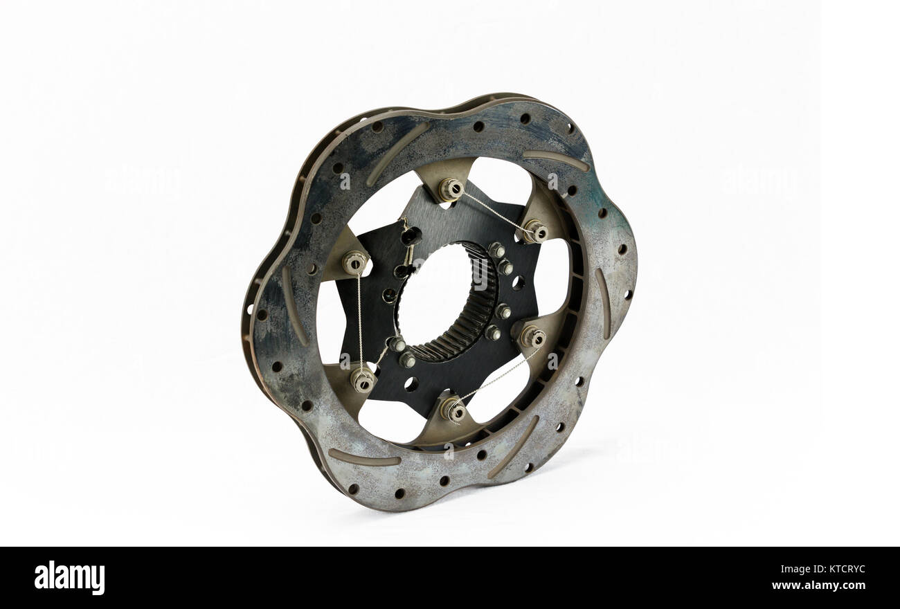 Broken, cracked and warped racing brake rotor Stock Photo Alamy