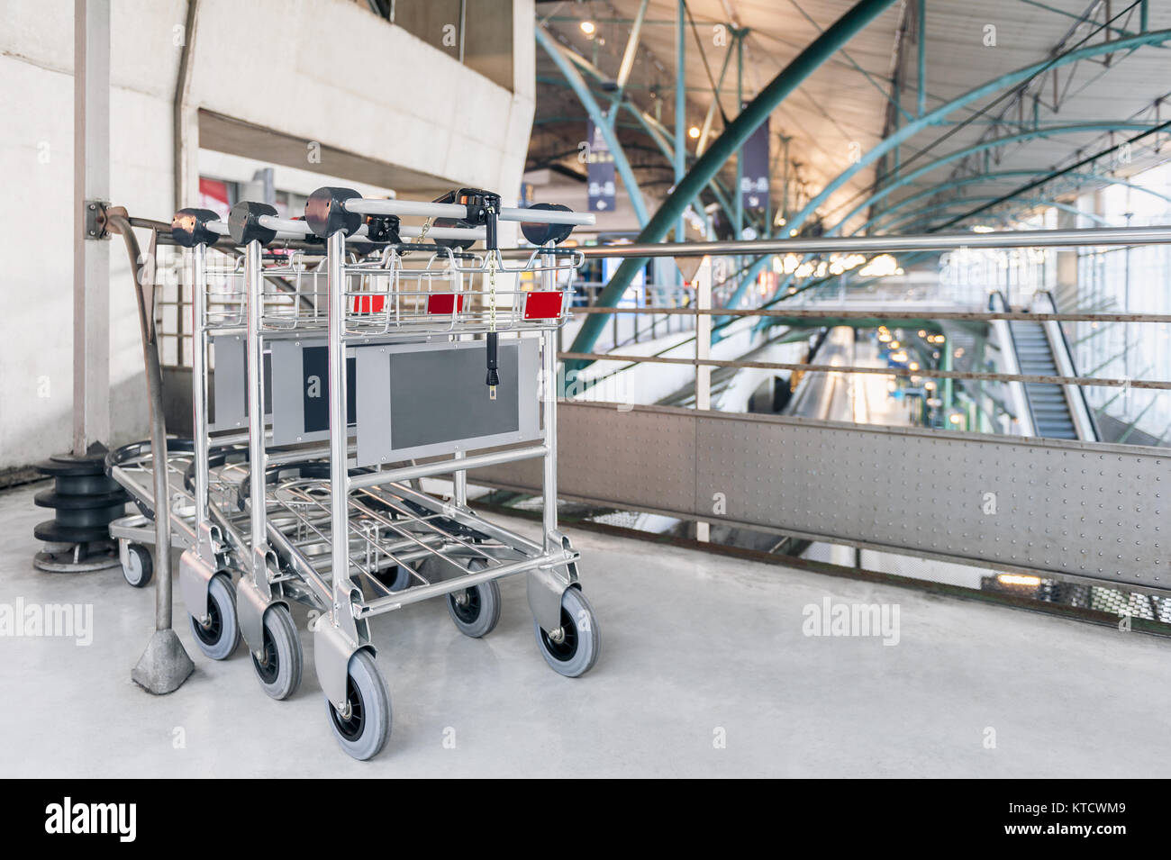Luggage Carts at Lille Europe Railway Station, Lille, Northern France Stock Photo