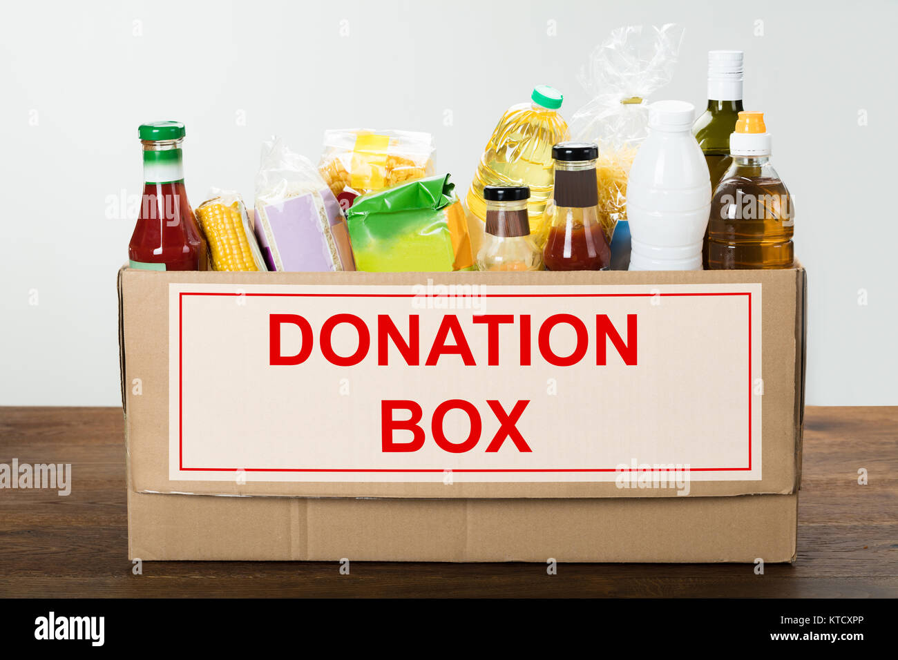 Food Items In Donation Box Stock Photo Alamy