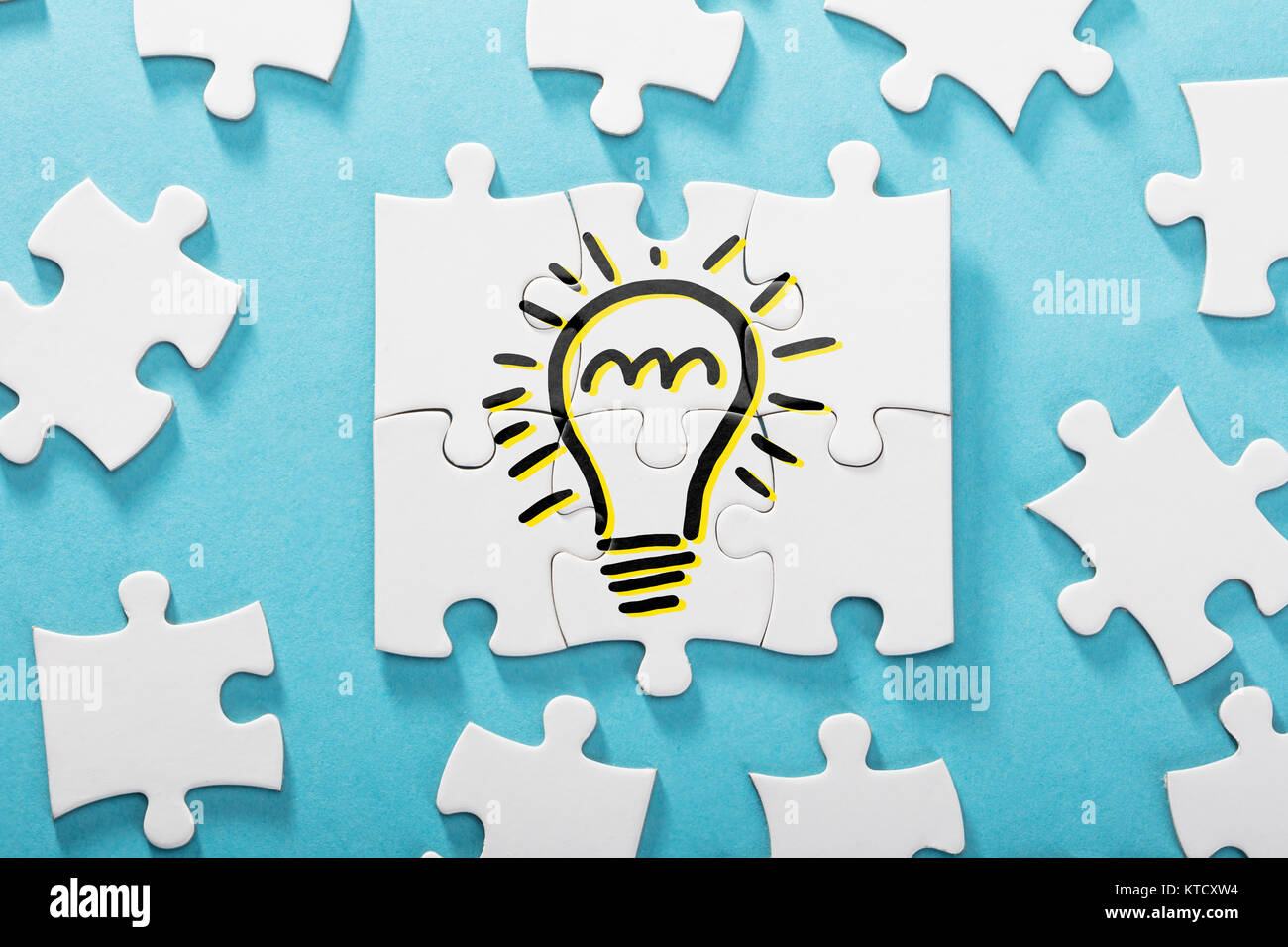 Light Bulb Icon On White Puzzle Stock Photo