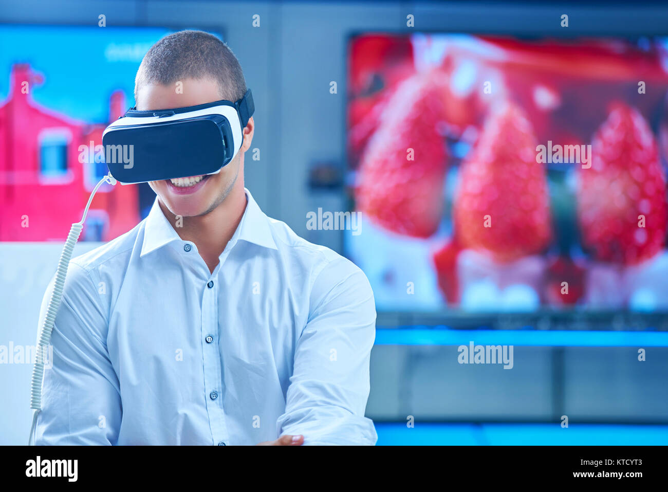 Man wearing virtual reality goggles Stock Photo - Alamy