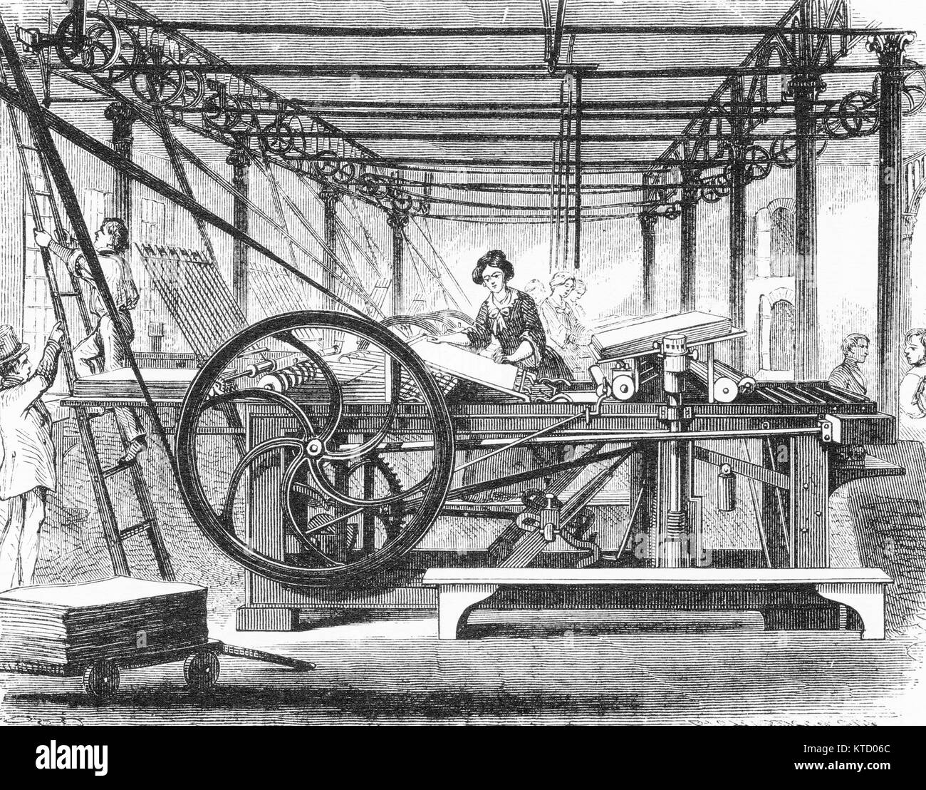 Engraving of workers using the power press at a printing company to print books. From The Harper Establishment, by Jacob Abbott, 1855. Stock Photo