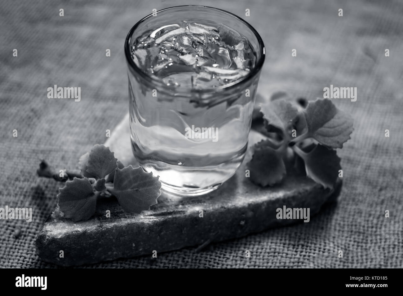 water of ajwain leaves and seeds,Trachyspermum ammi in a glass