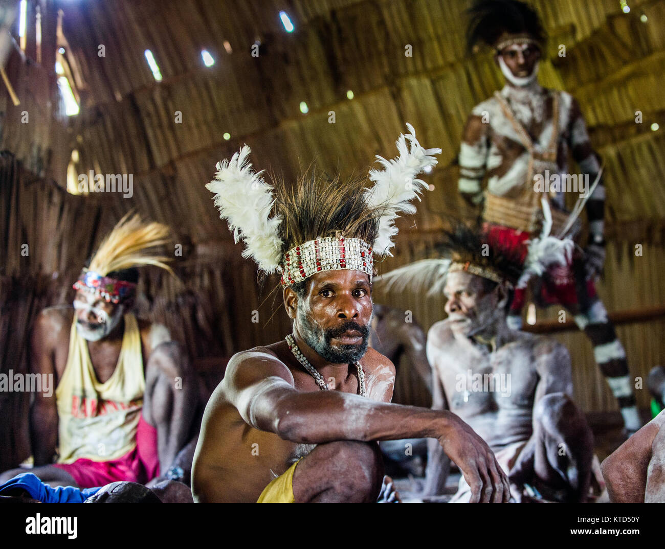 YOUW VILLAGE, ATSY DISTRICT, ASMAT REGION, IRIAN JAYA, NEW GUINEA, INDONESIA - MAY 23, 2016: Portrait of a man from the tribe of Asmat people with rit Stock Photo